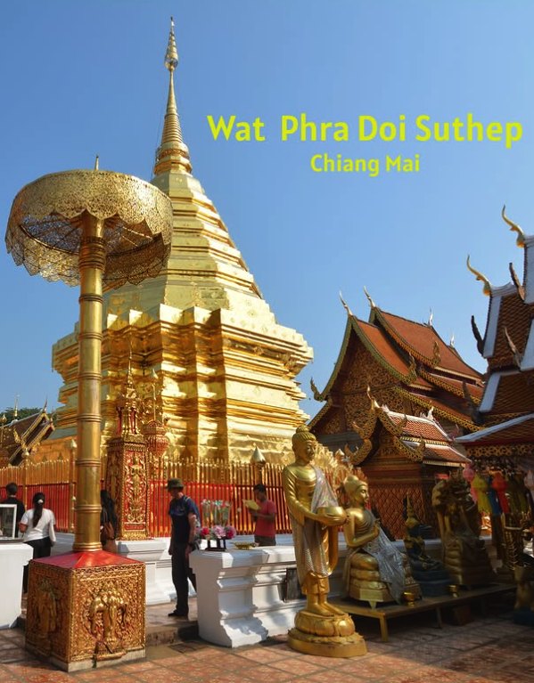 The chedi and temple roofs at Doi Suthep photographed from the cloister